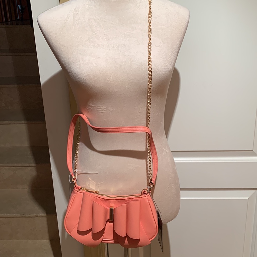 CROSSI NY. NWT. Beautiful Coral, crossbody bag with bow on front. Gold c… - Picture 8 of 8